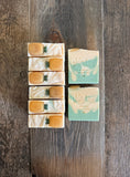 yellow and green soaps with pineapples on top