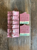 watermelon themed soap with sea salts on top